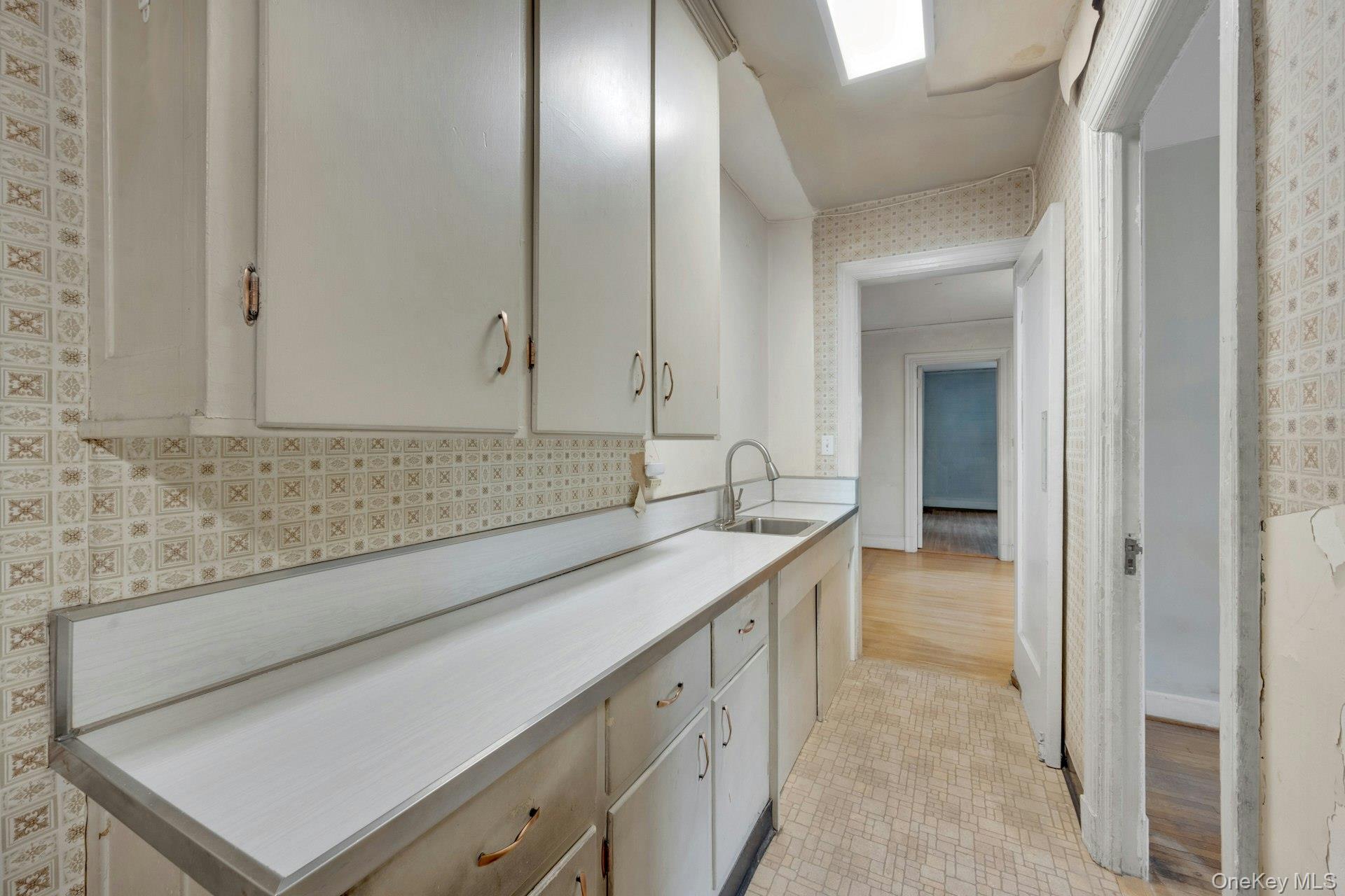3 Alden Place, Unit 1A Bronxville, NY 10708 - Photo 12 of 29 a bathroom with a sink and a mirror