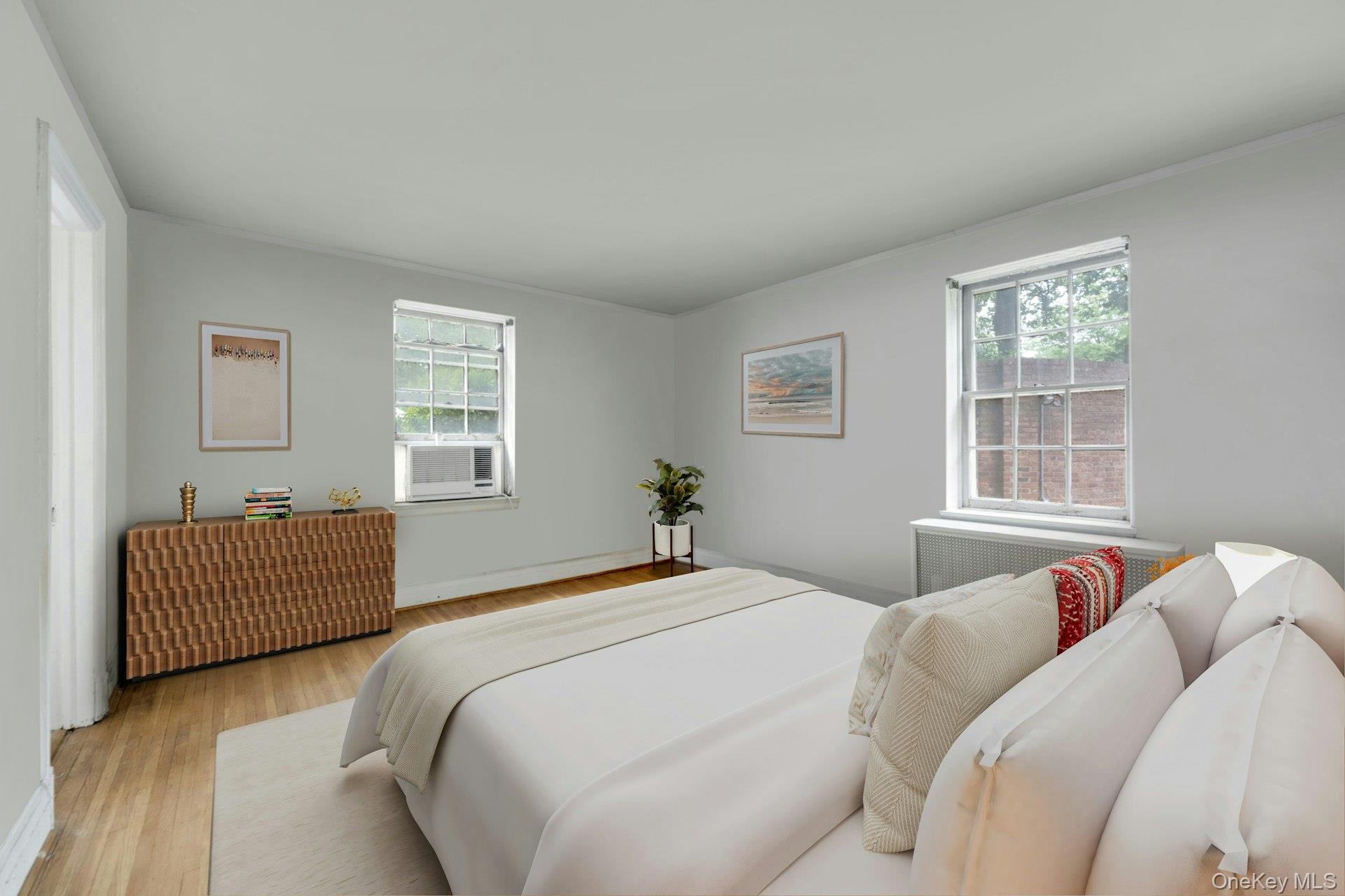 3 Alden Place, Unit 1A Bronxville, NY 10708 - Photo 19 of 29 a bedroom with a bed and a window