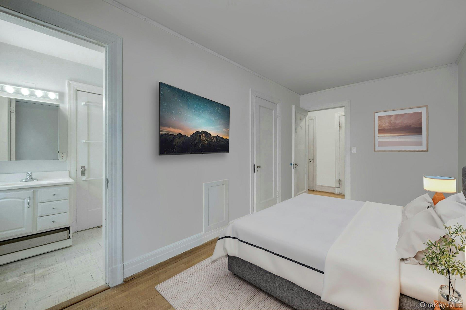 3 Alden Place, Unit 1A Bronxville, NY 10708 - Photo 24 of 29 a bedroom with a bed and a flat screen tv