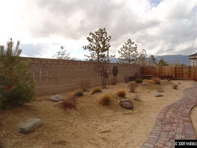 1660 Silver Thread Drive Reno, NV 89521 - Photo 8 of 9 a view of a backyard of the house