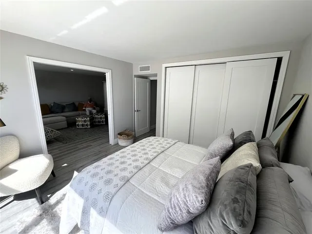 a view of a lake with a building in the background