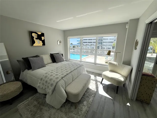 a view of a chairs and tables in patio