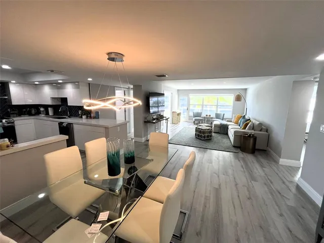 a living room with furniture or couch and a flat screen tv