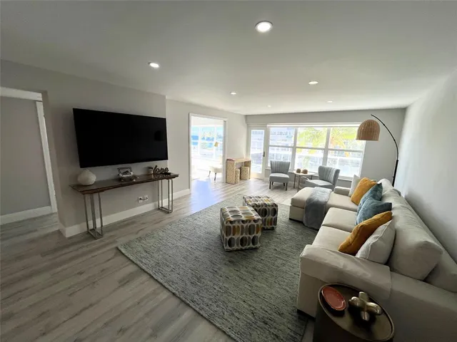 a kitchen with a stove a sink and a refrigerator
