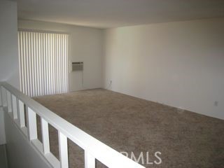 2134 South Acama Street Anaheim, CA 92802 - Photo 25 of 38 a view of an empty room and staircase