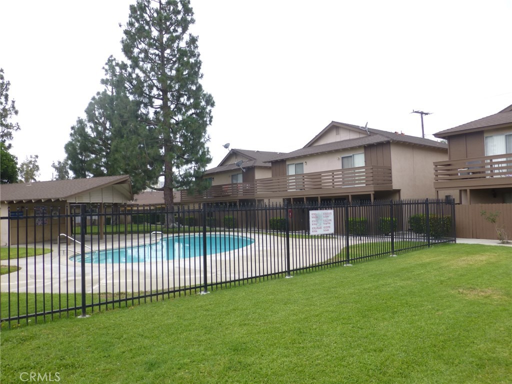 2134 South Acama Street Anaheim, CA 92802 - Photo 3 of 38 a view of a backyard with a garden and deck