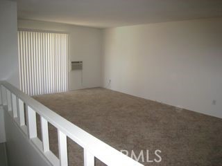 2134 South Acama Street Anaheim, CA 92802 - Photo 34 of 38 a view of an empty room and staircase