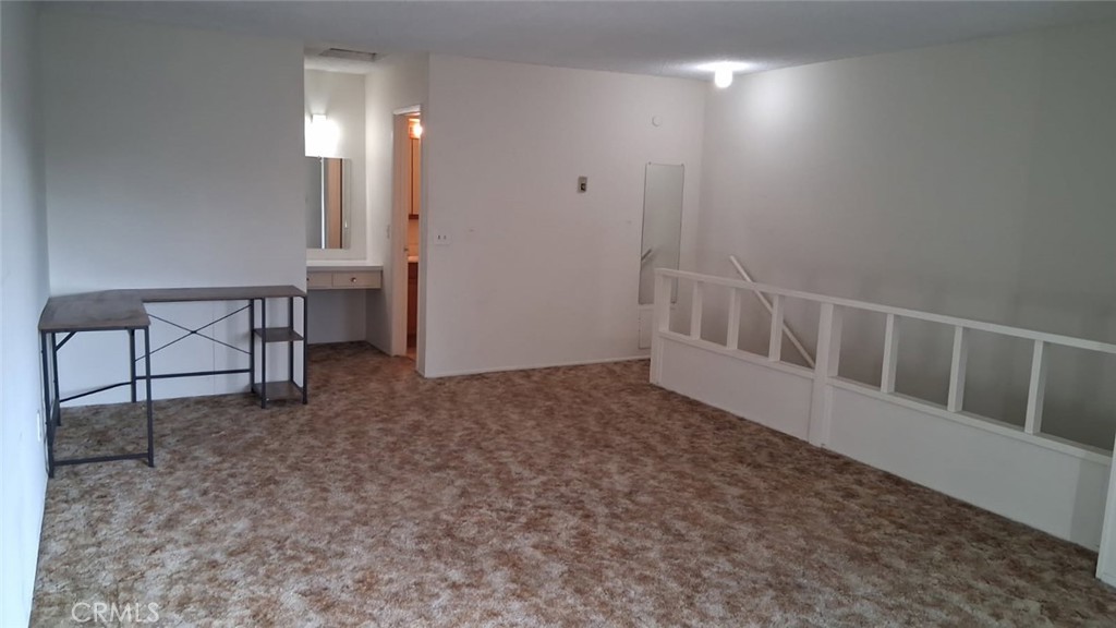 2134 South Acama Street Anaheim, CA 92802 - Photo 36 of 38 a view of a room with a table and chairs