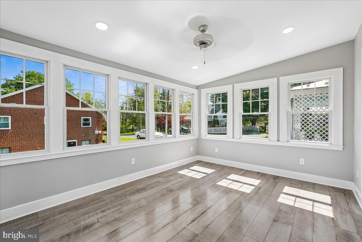 209 Rice Street Berryville, VA 22611 - Photo 20 of 67 Sunroom with walls of windows