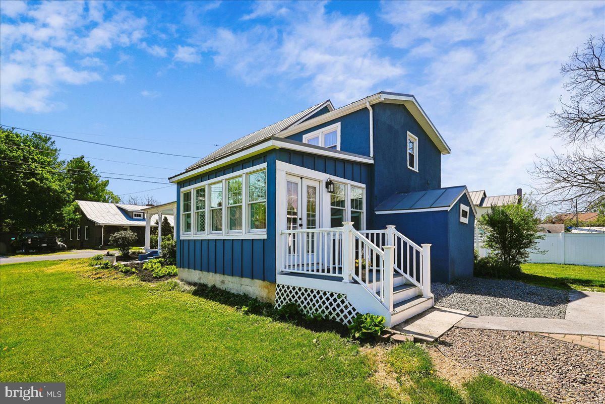 209 Rice Street Berryville, VA 22611 - Photo 39 of 67 View of sunroom and stairs to rear of home