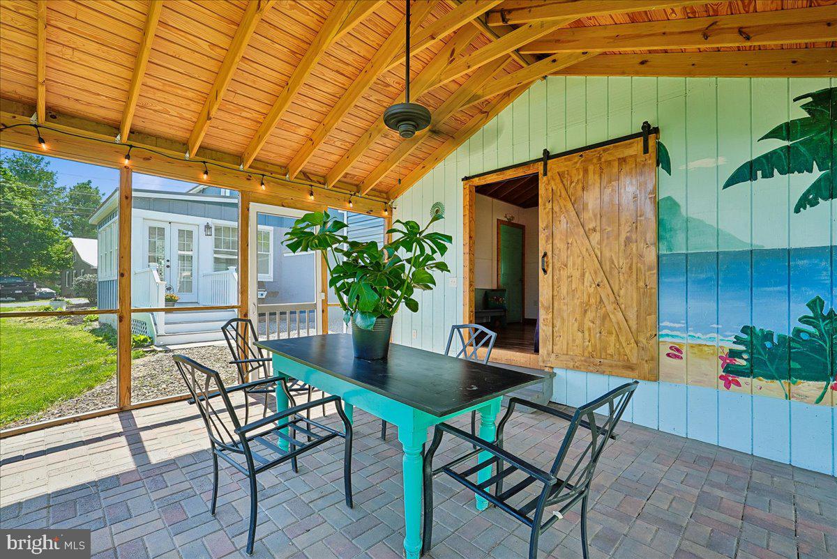 209 Rice Street Berryville, VA 22611 - Photo 43 of 67 Scree porch with barn door to she shed