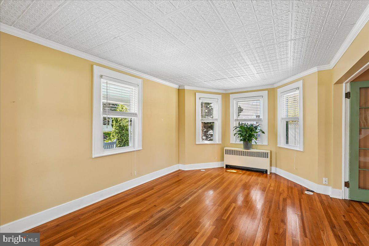 209 Rice Street Berryville, VA 22611 - Photo 8 of 67 Refinished HW floors and bay window in living rm