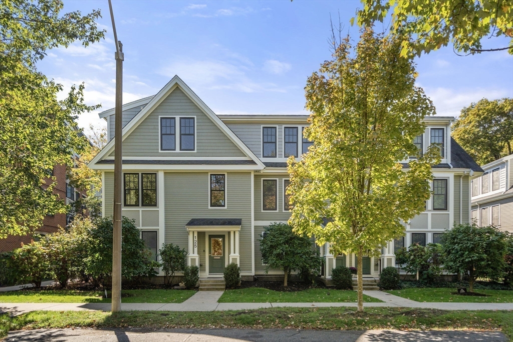 125 Crowninshield Road, Unit 125 Brookline, MA 02446 - Photo 21 of 21 front view of a house with a yard