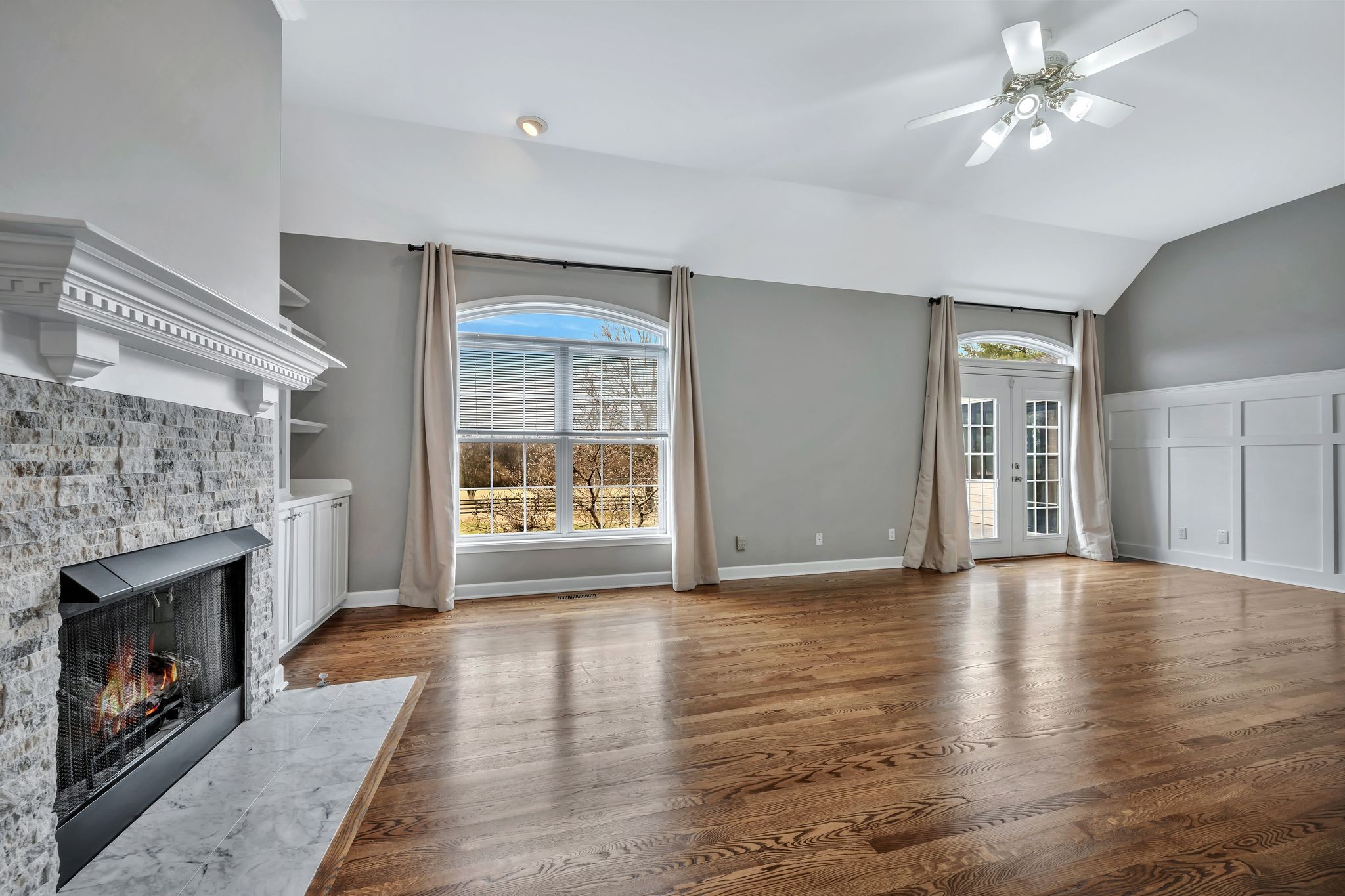 1576 Old Hillsboro Road Franklin, TN 37069 - Photo 12 of 57 a view of an empty room with window and wooden floor