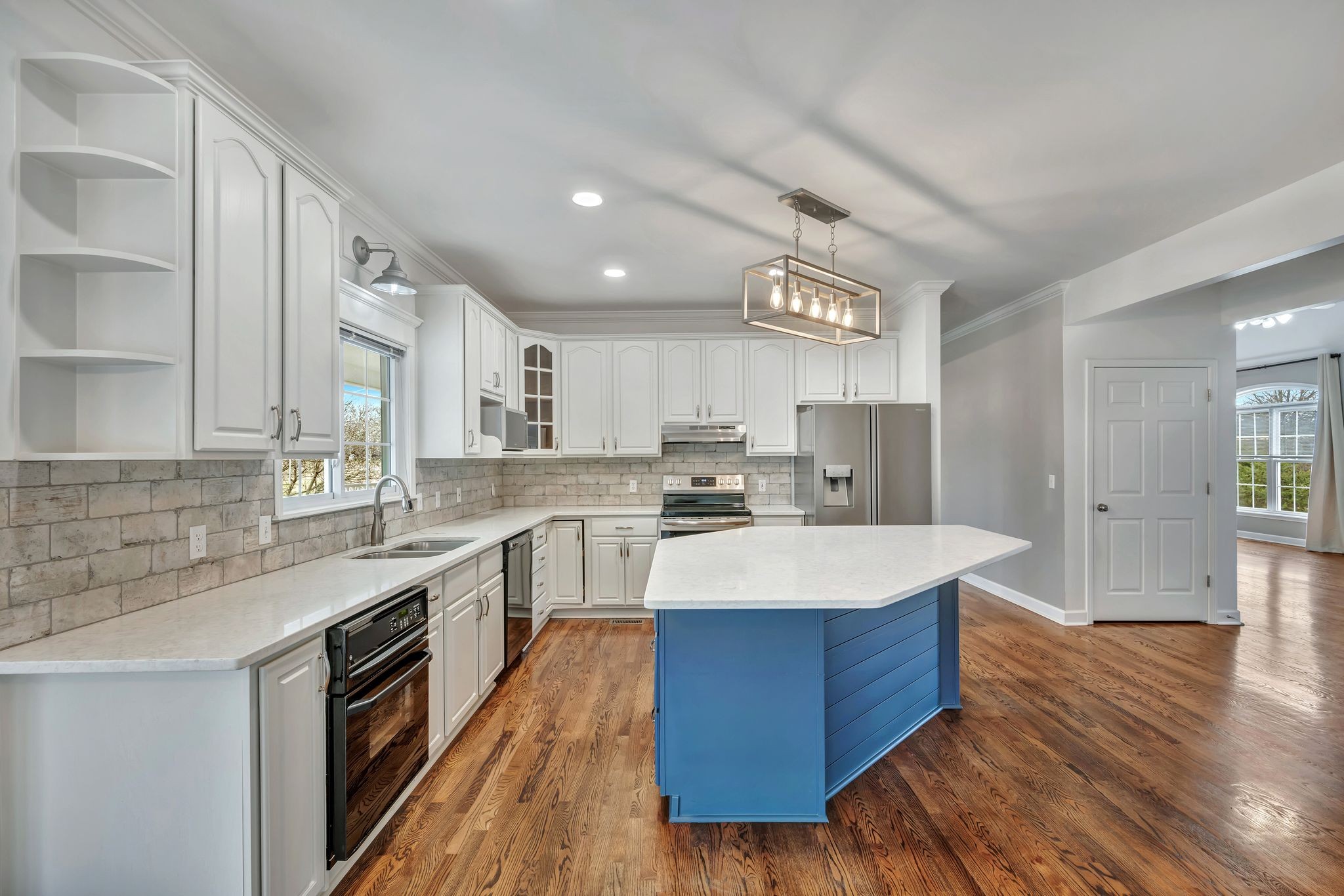1576 Old Hillsboro Road Franklin, TN 37069 - Photo 16 of 57 a large kitchen with stainless steel appliances a sink and cabinets