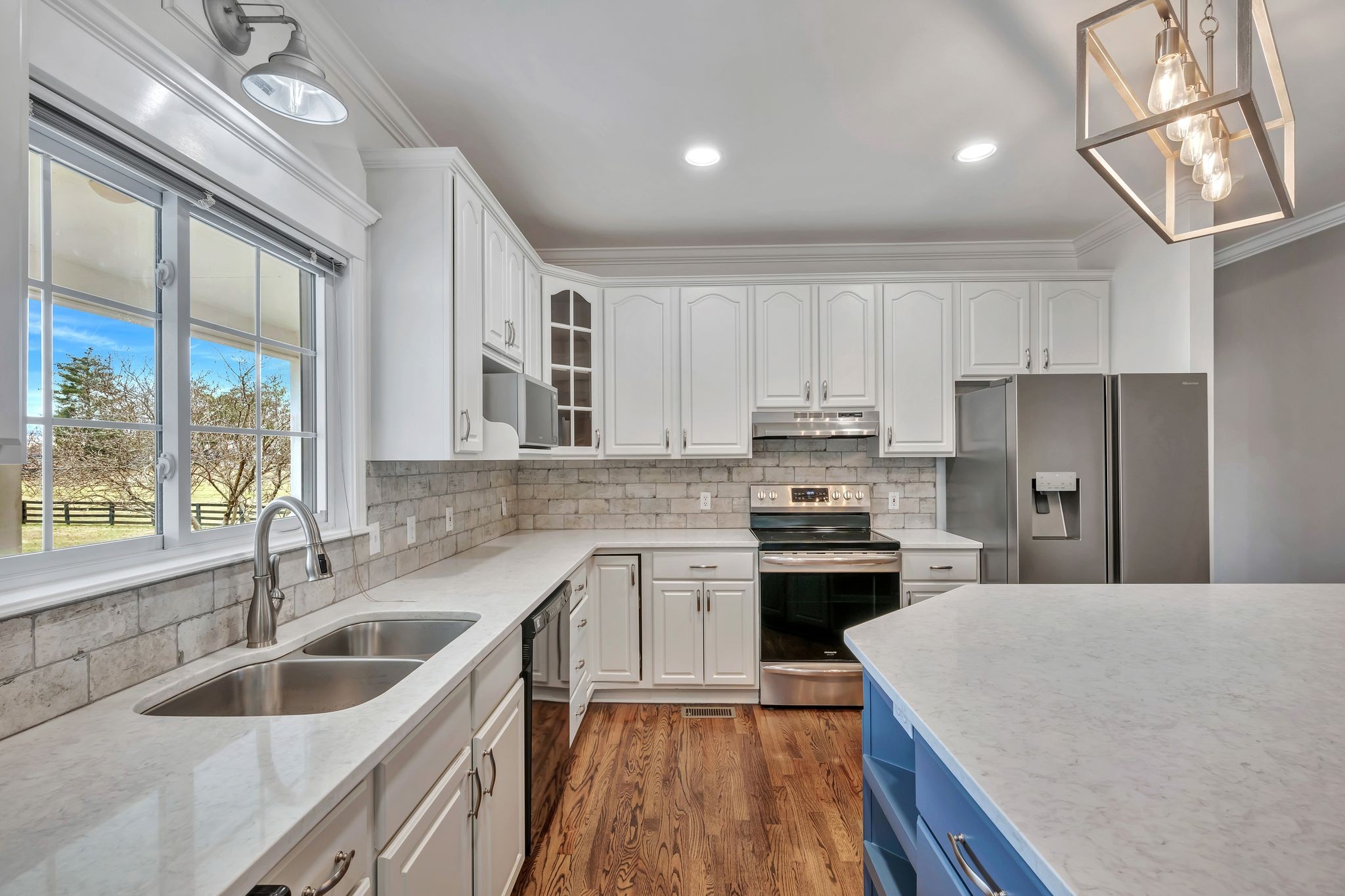 1576 Old Hillsboro Road Franklin, TN 37069 - Photo 17 of 57 a kitchen with granite countertop a sink stainless steel appliances and cabinets