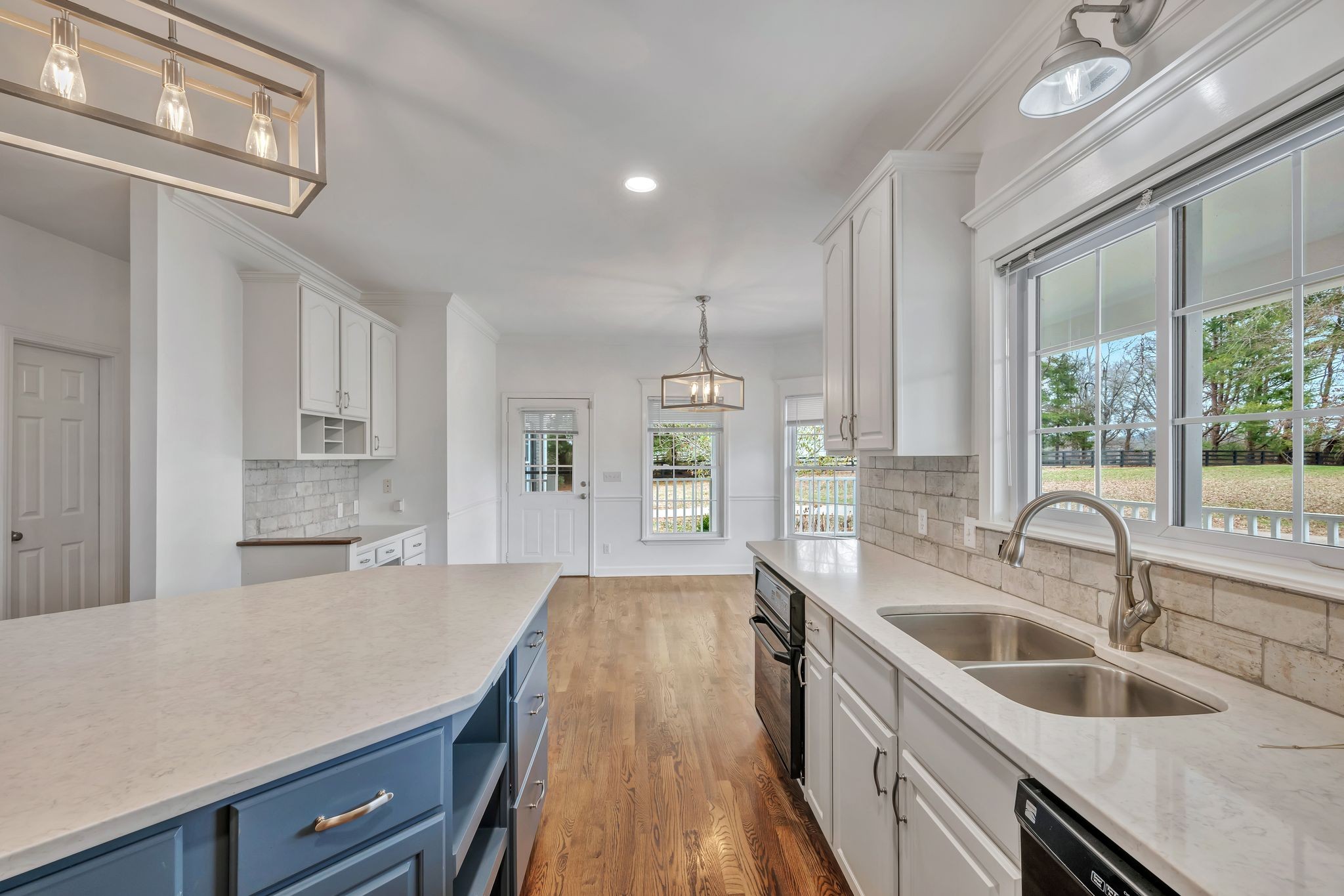 1576 Old Hillsboro Road Franklin, TN 37069 - Photo 18 of 57 a kitchen with a sink stove and cabinets