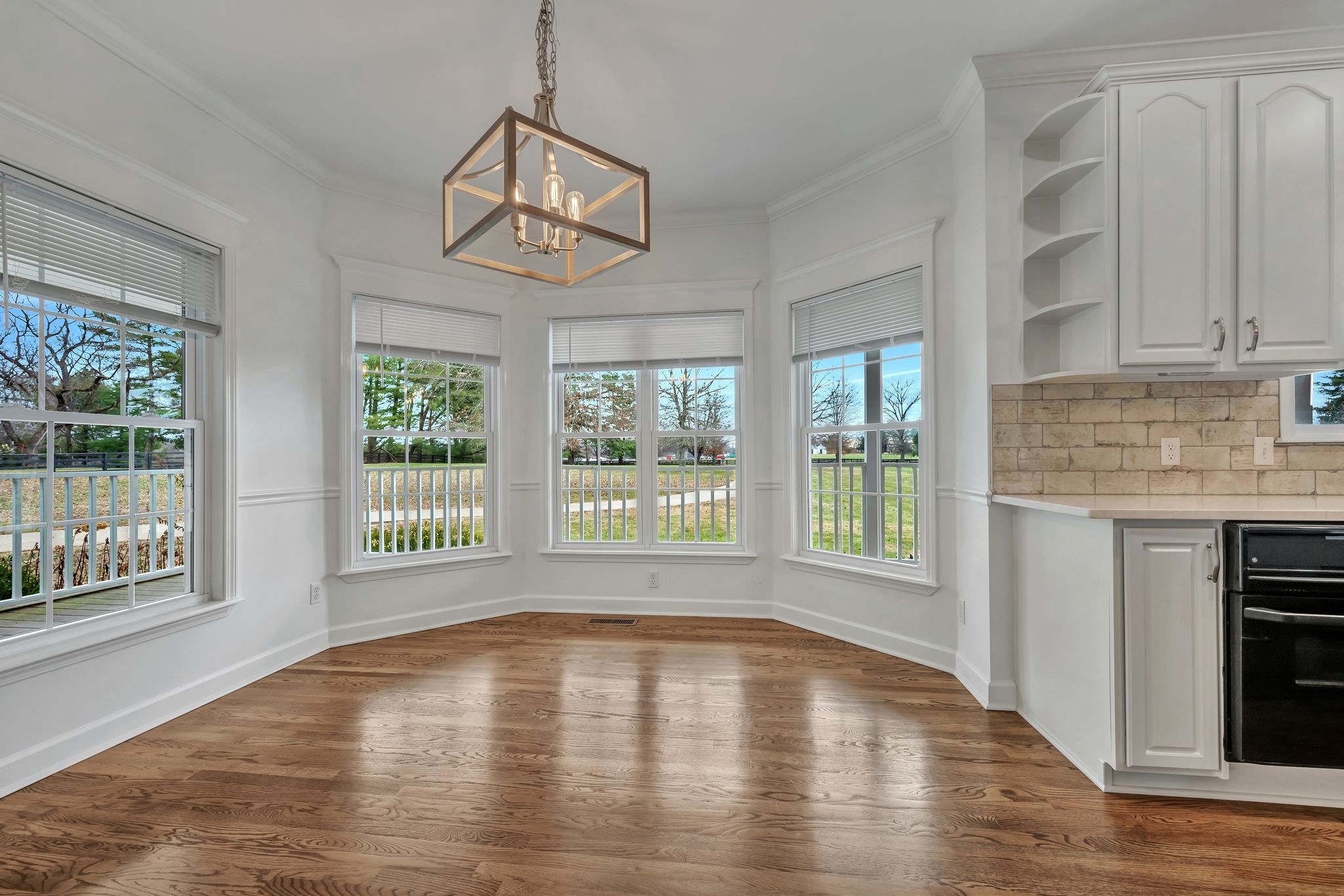 1576 Old Hillsboro Road Franklin, TN 37069 - Photo 19 of 57 a view of empty room with wooden floor and fan