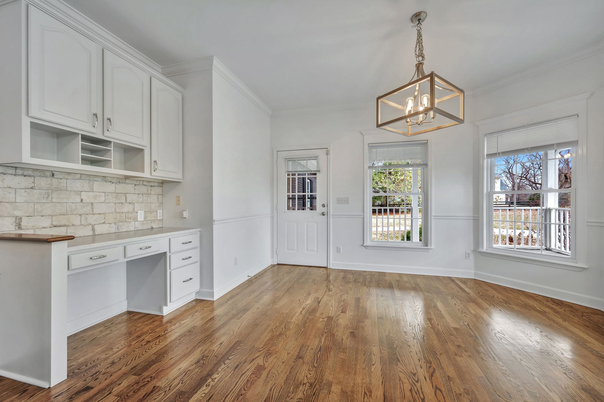 1576 Old Hillsboro Road Franklin, TN 37069 - Photo 20 of 57 a view of an empty room with a window and wooden floor