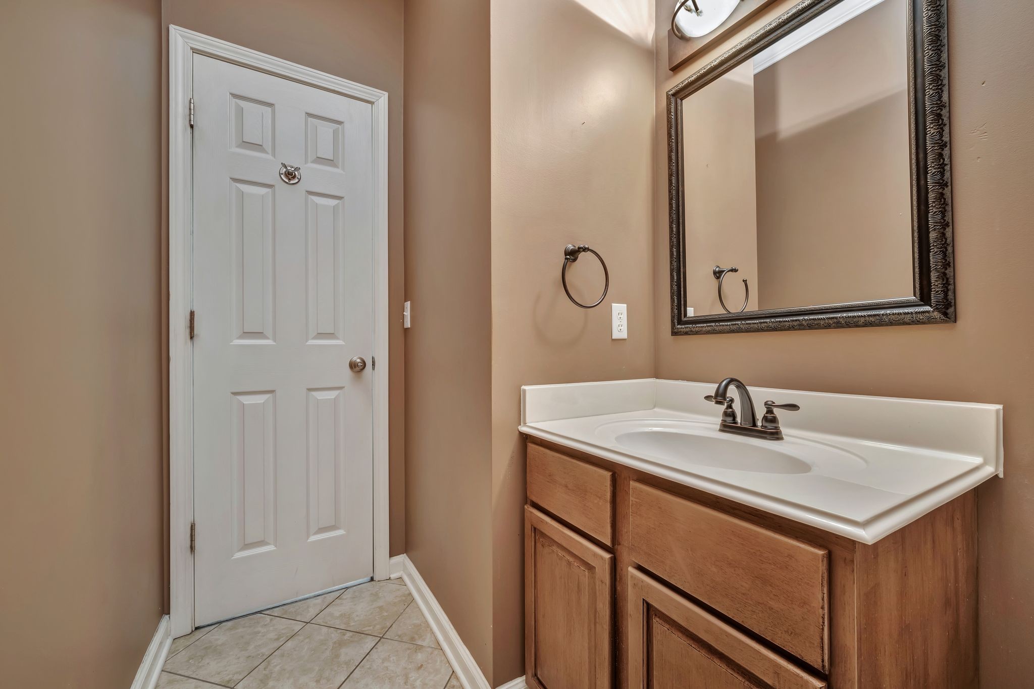 1576 Old Hillsboro Road Franklin, TN 37069 - Photo 22 of 57 a bathroom with a sink and a mirror