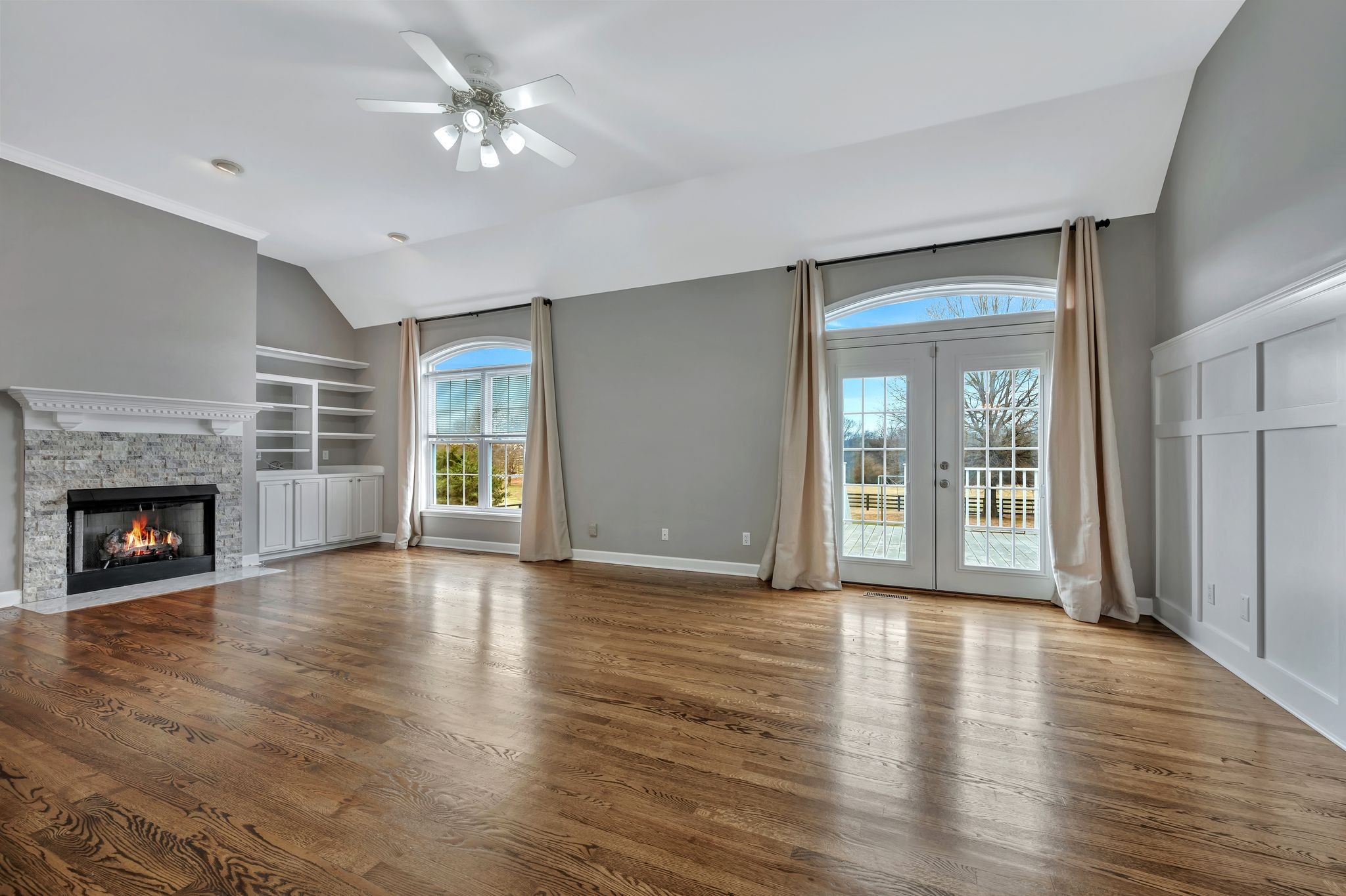 1576 Old Hillsboro Road Franklin, TN 37069 - Photo 9 of 57 a view of an empty room with window and fire place