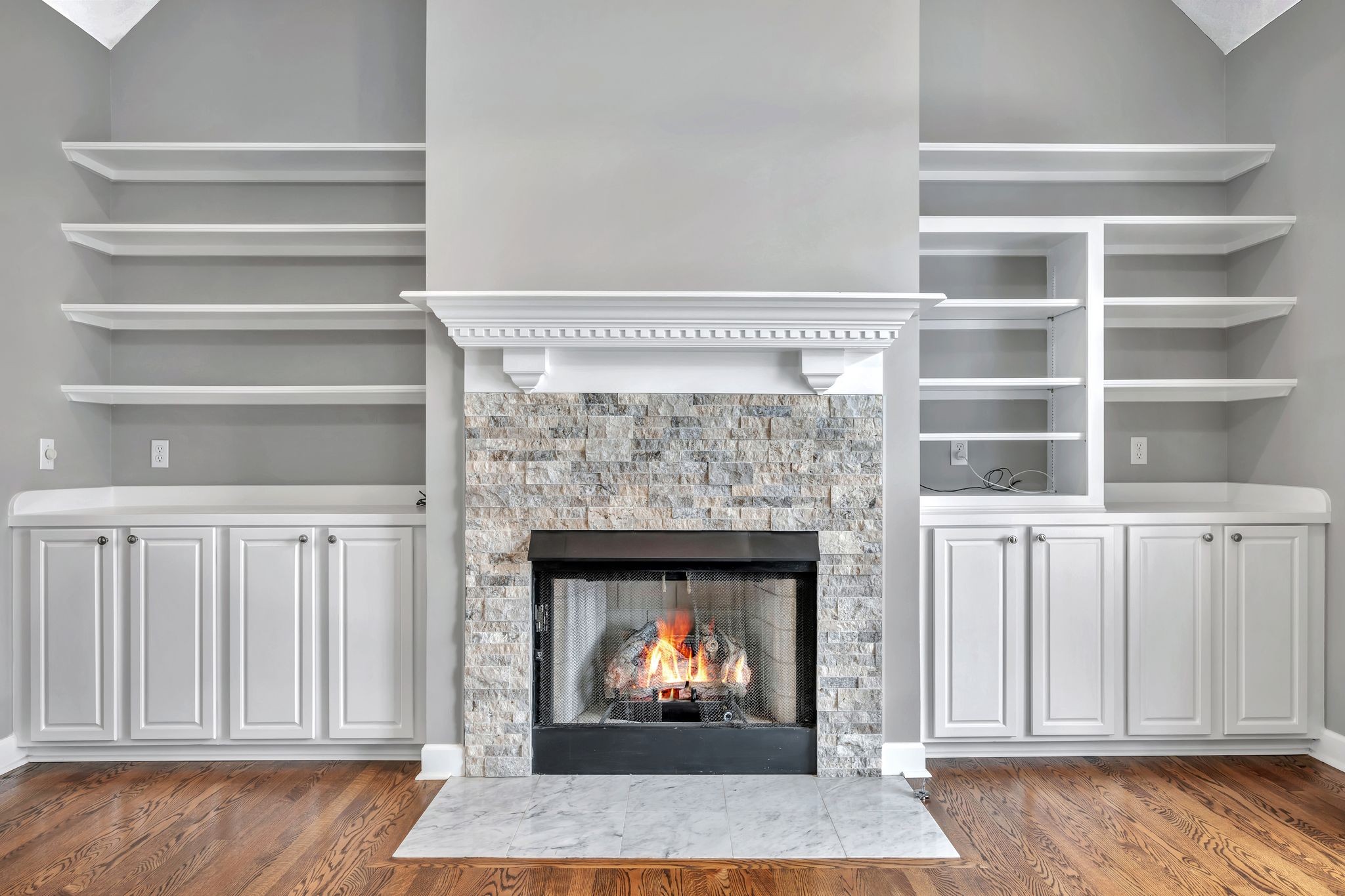 1576 Old Hillsboro Road Franklin, TN 37069 - Photo 10 of 57 a living room with a fireplace cabinet and a fireplace