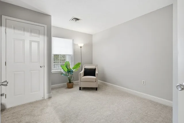 a view of a room that has a window in it