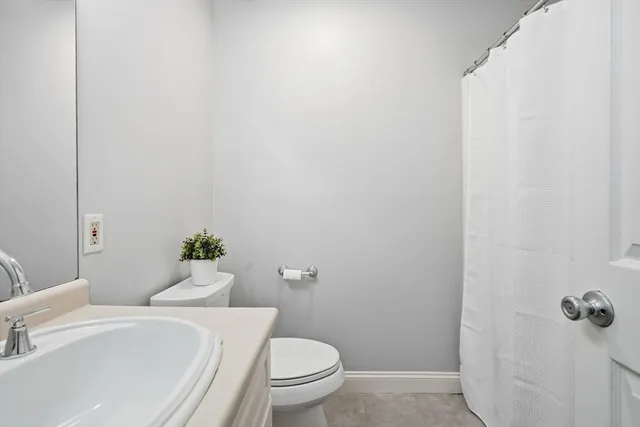 a view of a balcony with wooden floor