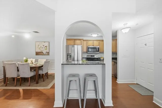 a view of a dining room with furniture