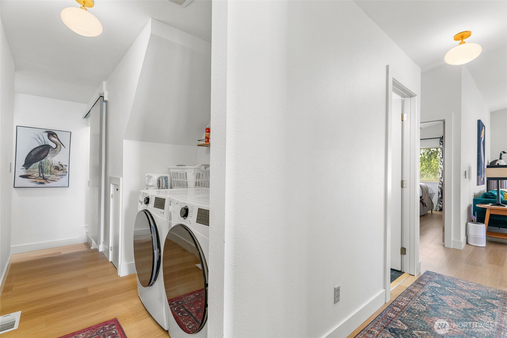 32 Midland Road Brewster, WA 98812 - Photo 21 of 40 a view of a hallway with washer and dryer