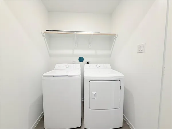 a kitchen with a refrigerator sink and stove