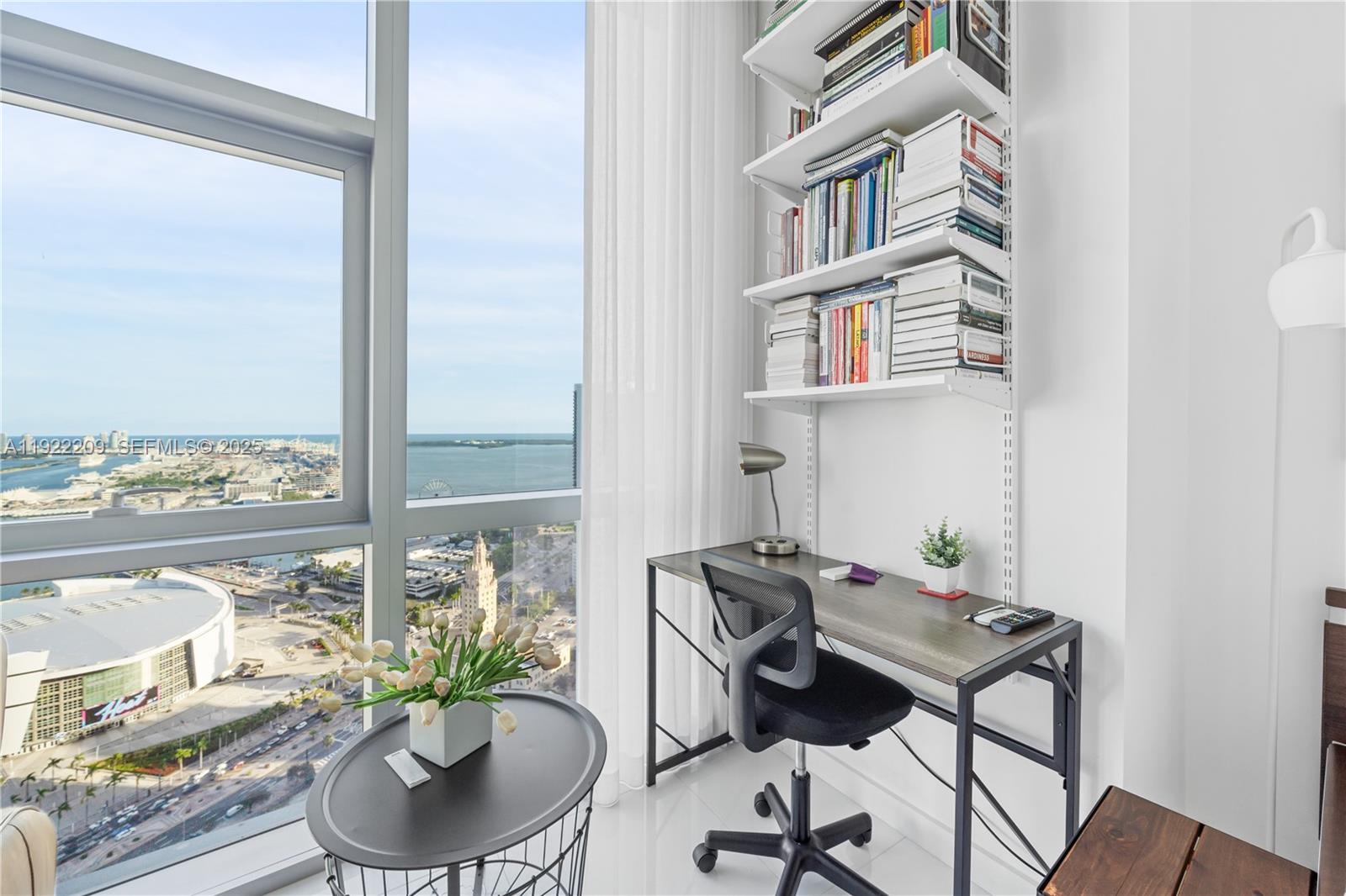 851 Northeast 1st Avenue, Unit 3911 Miami, FL 33132 - Photo 32 of 75 a balcony with furniture and a potted plant