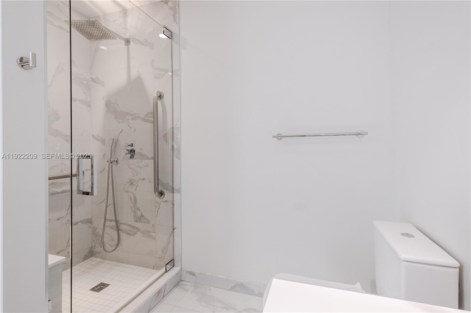 851 Northeast 1st Avenue, Unit 3911 Miami, FL 33132 - Photo 34 of 75 a bathroom with a shower