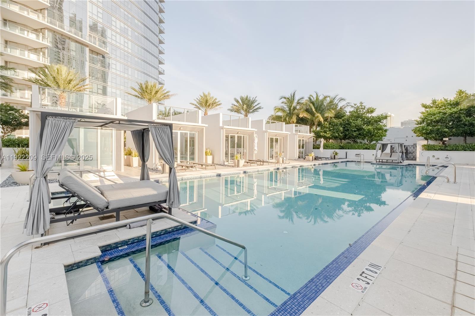 851 Northeast 1st Avenue, Unit 3911 Miami, FL 33132 - Photo 58 of 75 a view of a house with swimming pool