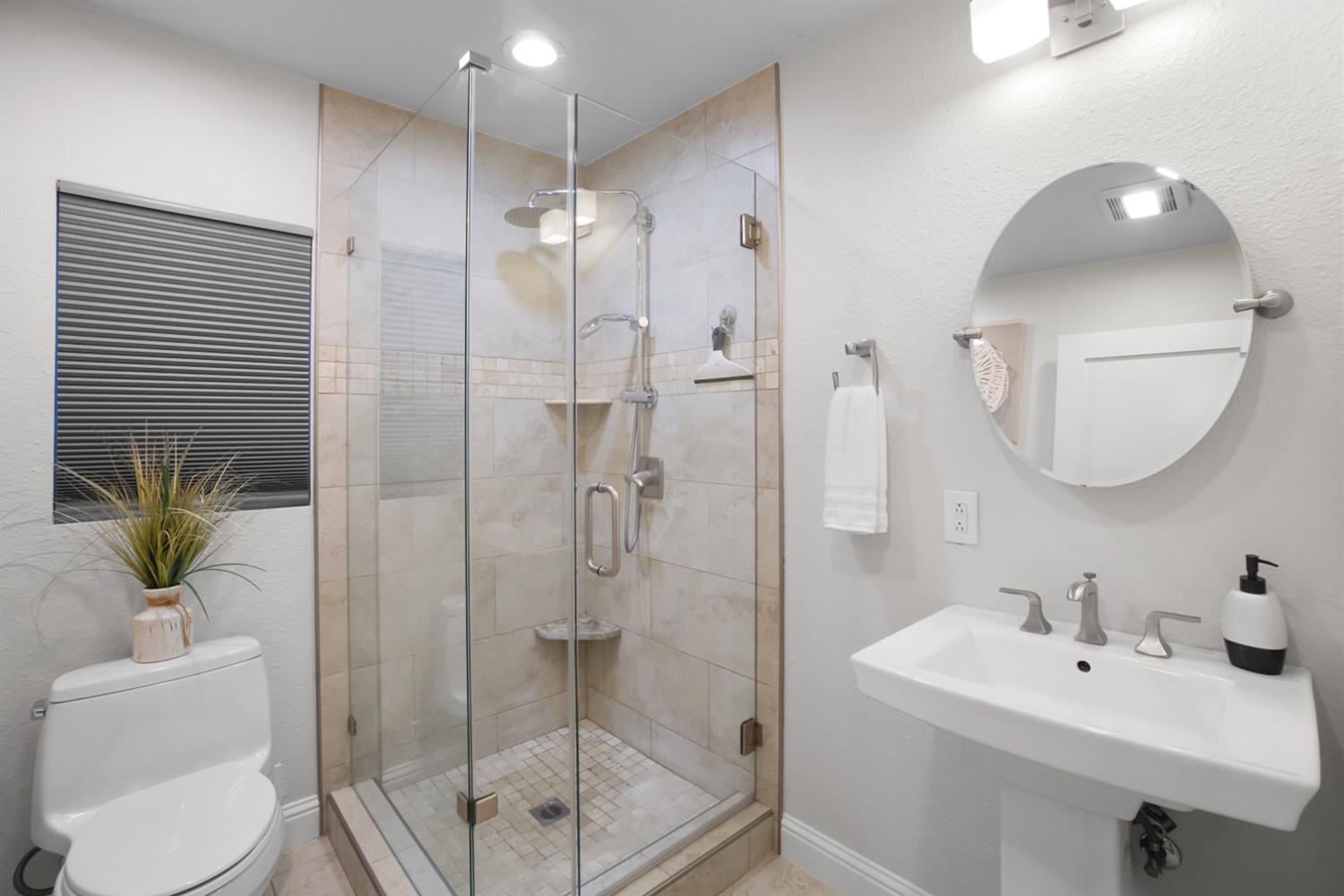 6299 Horseshoe Bar Road Loomis, CA 95650 - Photo 19 of 43 a bathroom with a sink toilet and shower