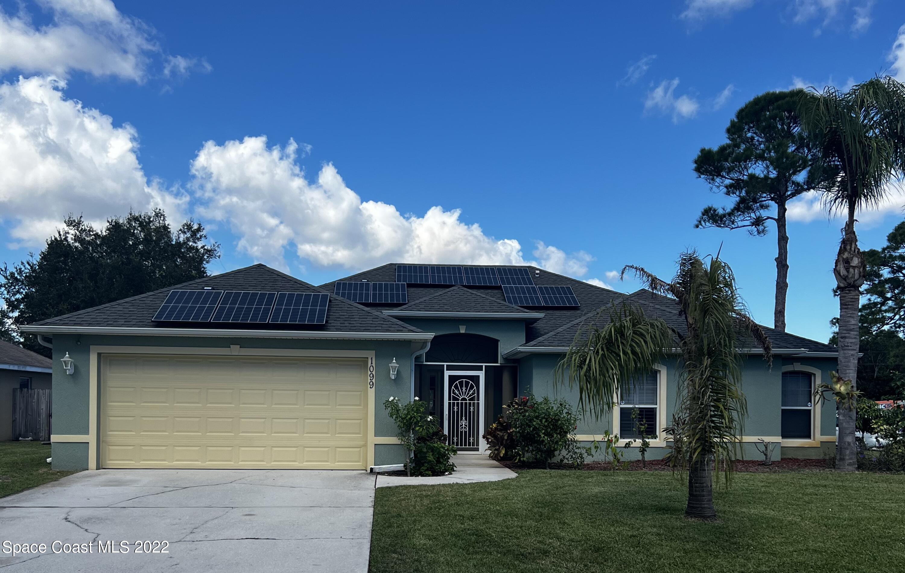 1099 Flagami Road Southeast Palm Bay, FL 32909 - Photo 1 of 28 Front