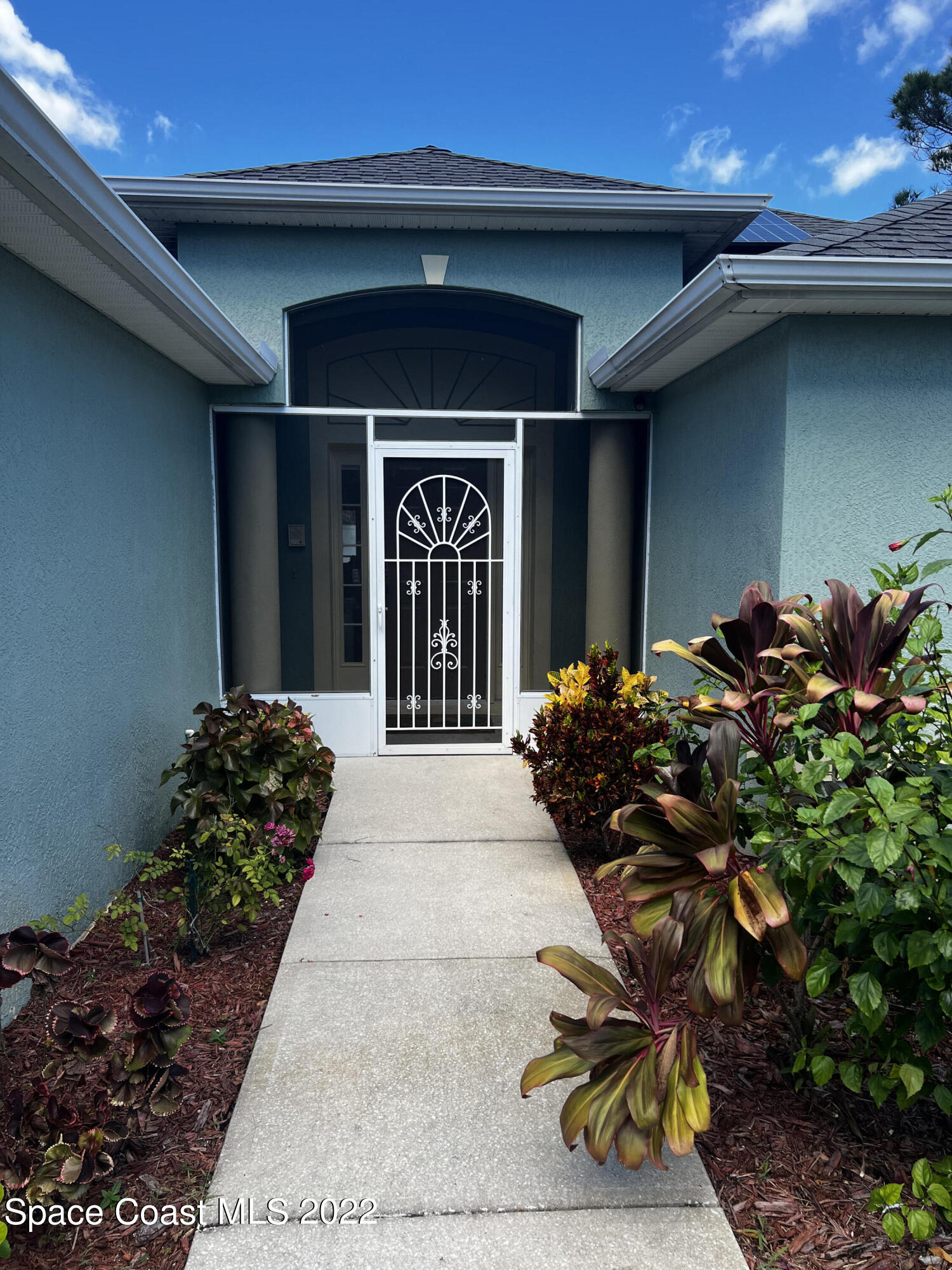 1099 Flagami Road Southeast Palm Bay, FL 32909 - Photo 2 of 28 Entry