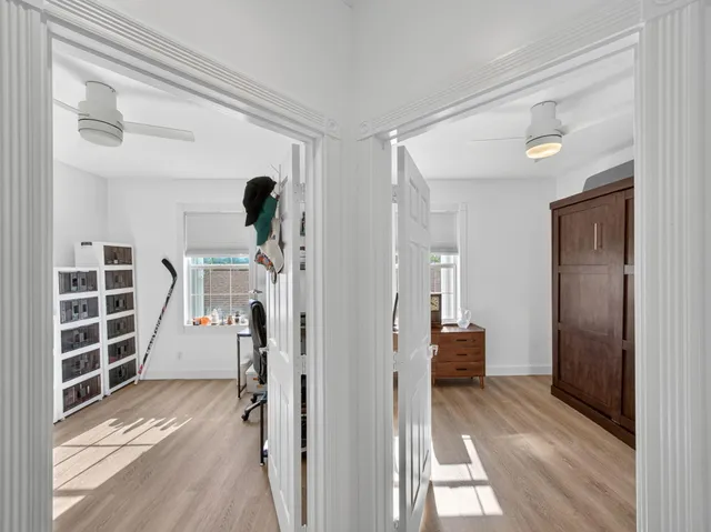 a view of hallway with walk in closet