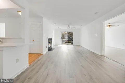 a view of a livingroom with wooden floor