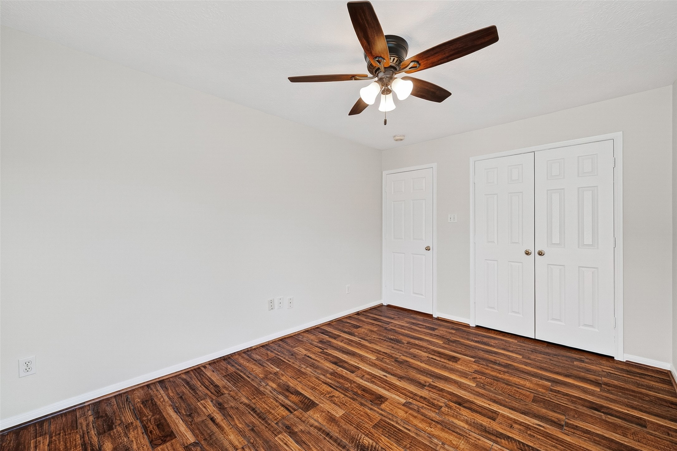 4539 Springfield Lakes Street Sugar Land, TX 77479 - Photo 17 of 34 a view of a room with wooden floor