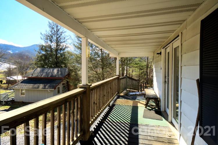 4904 Crabtree Mountain Road Clyde, NC 28721 - Photo 27 of 37 a view of balcony with couch