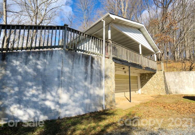 4904 Crabtree Mountain Road Clyde, NC 28721 - Photo 37 of 37 a view of entryway with wooden floor