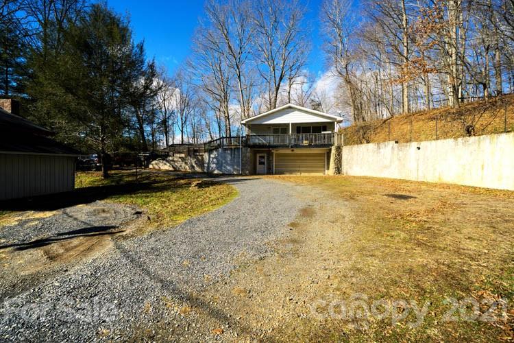 4904 Crabtree Mountain Road Clyde, NC 28721 - Photo 9 of 37 a view of a house with a yard