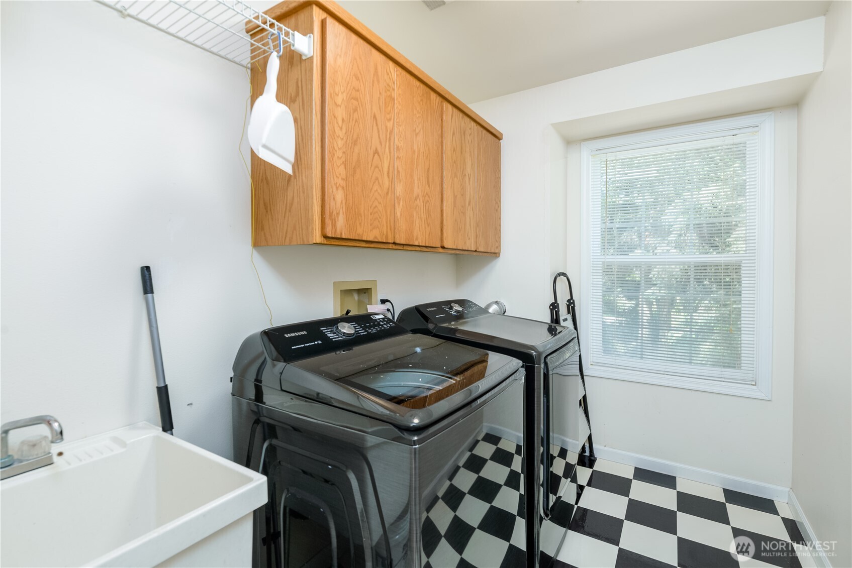 301 Mt Pleasant Estates Road Port Angeles, WA 98362 - Photo 24 of 40 a utility room with sink dryer and washer