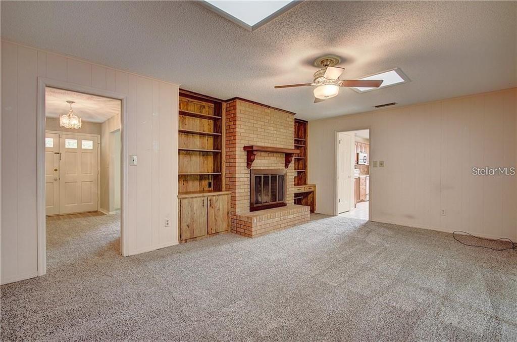 1201 Wolverine Trail Winter Springs, FL 32708 - Photo 11 of 29 a view of an empty room with a ceiling fan