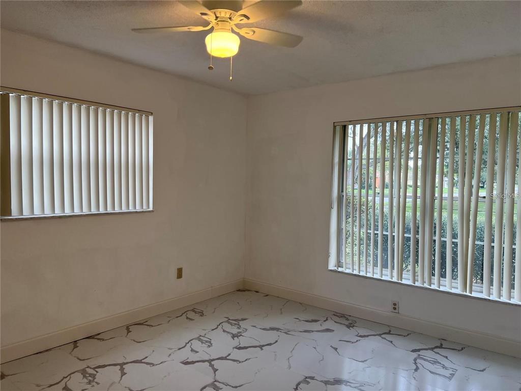 1201 Wolverine Trail Winter Springs, FL 32708 - Photo 18 of 29 a view of an empty room with a window