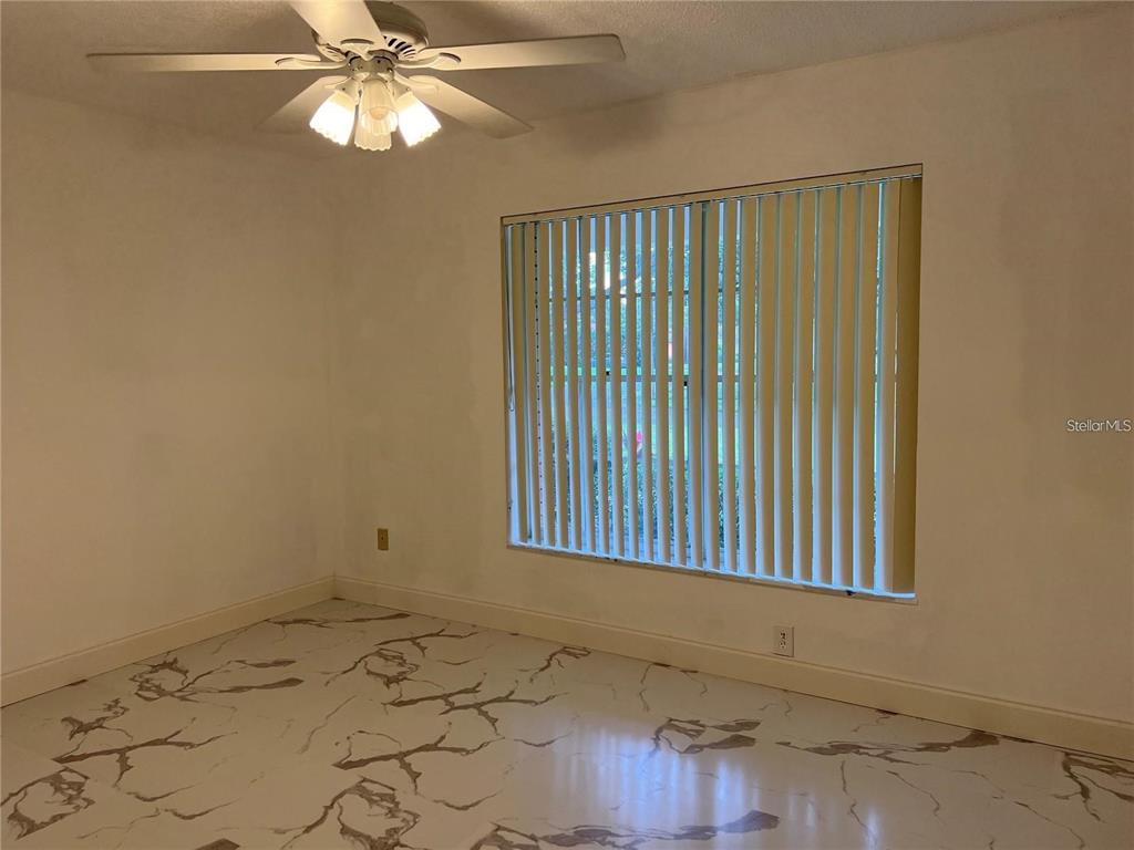 1201 Wolverine Trail Winter Springs, FL 32708 - Photo 19 of 29 a view of an empty room with a window