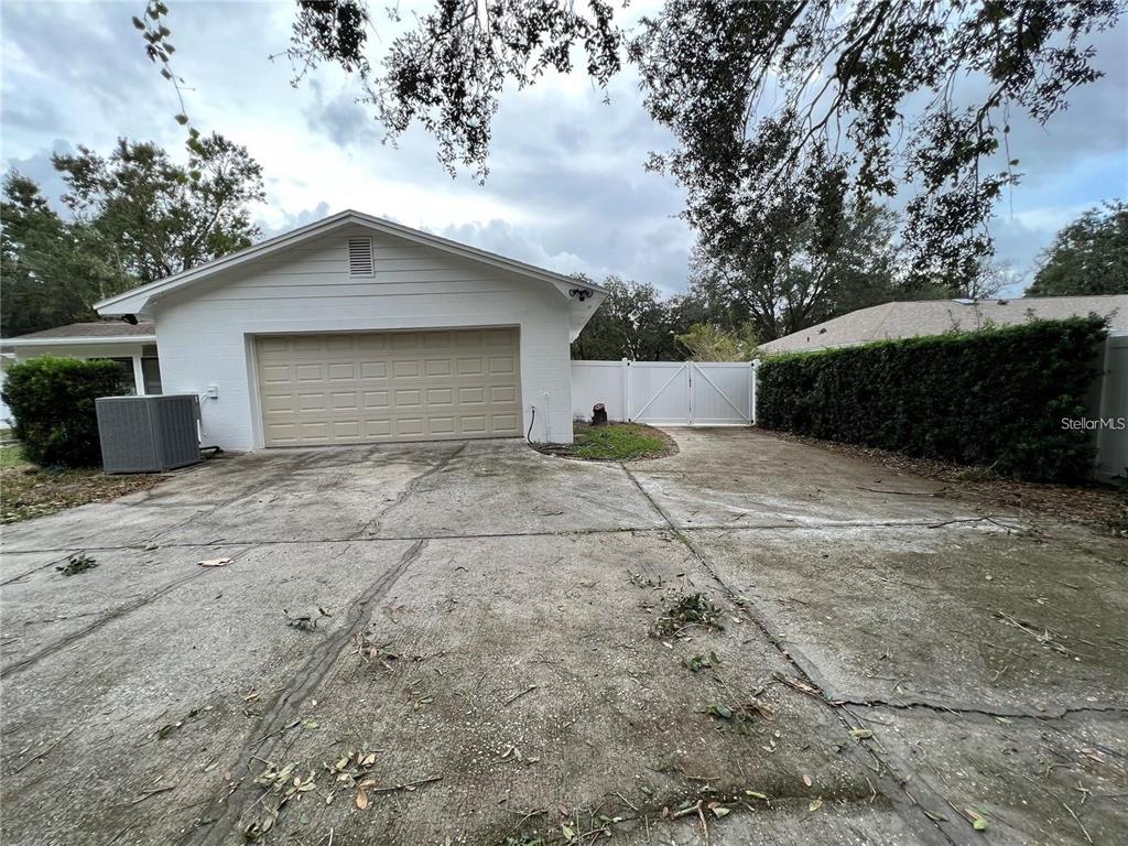 1201 Wolverine Trail Winter Springs, FL 32708 - Photo 28 of 29 a front view of a house with a yard