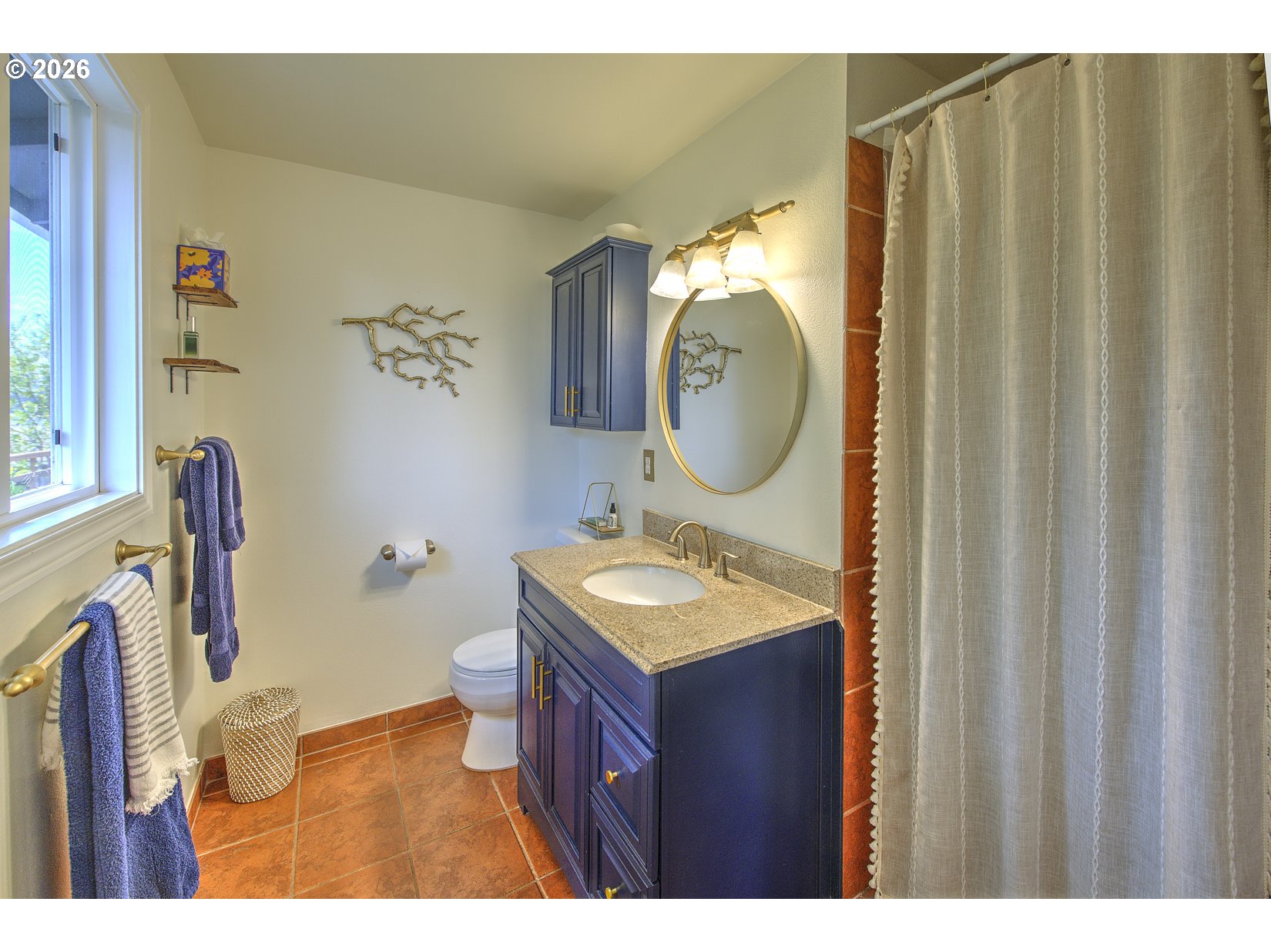 16020 Southwest Rosa Road Beaverton, OR 97007 - Photo 12 of 42 a bathroom with a sink toilet and mirror