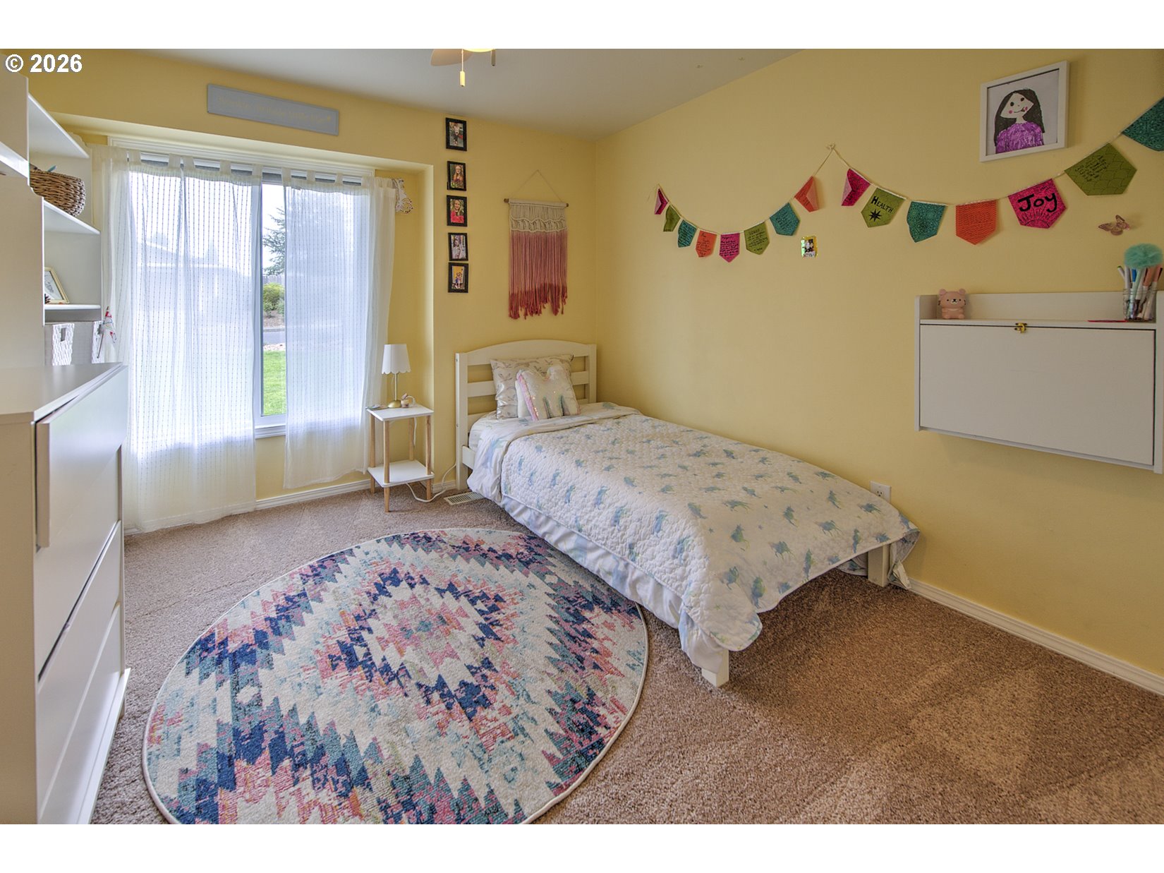 16020 Southwest Rosa Road Beaverton, OR 97007 - Photo 14 of 42 a bedroom with a bed and a window